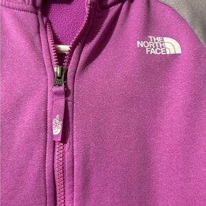 Pink and Grey The North face light weight jacket with tumb holes.